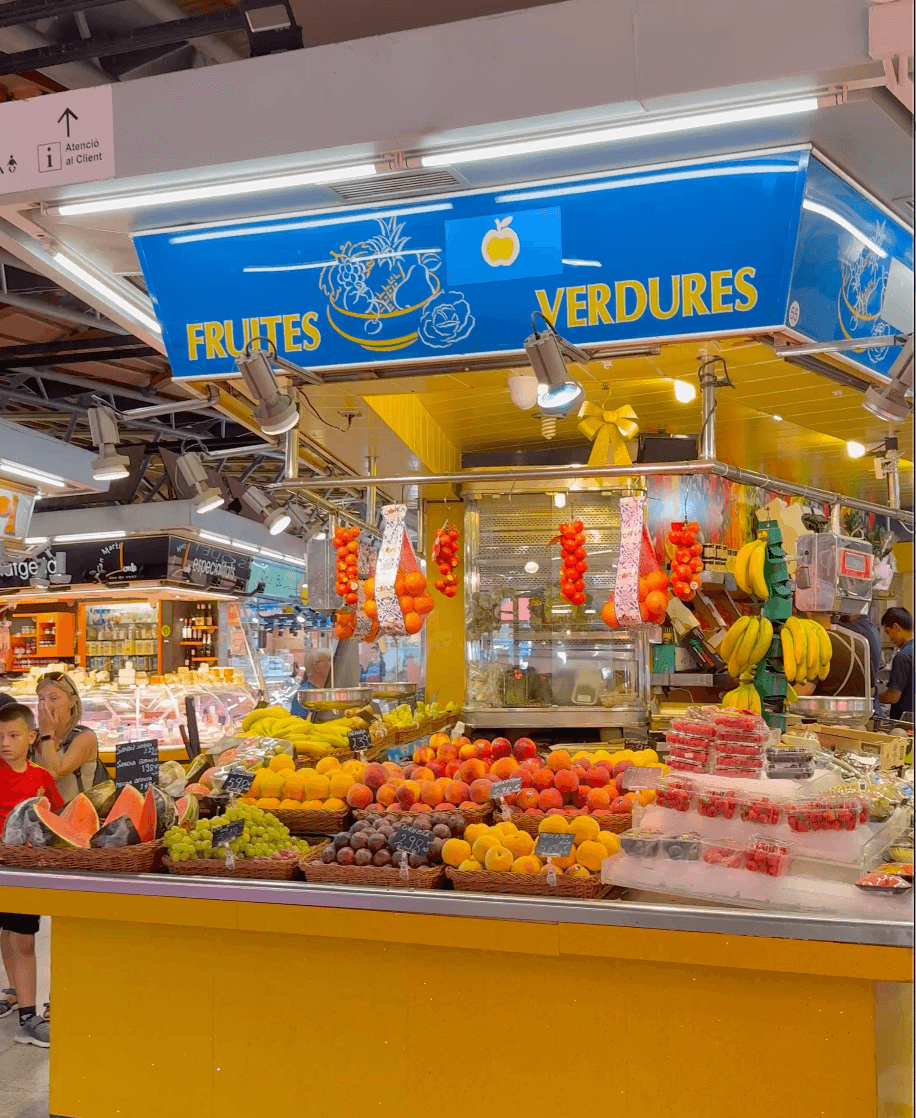 Fresh fruit and produce stalls inside Santa Caterina Market, Barcelona